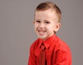 emotional boy in red shirt Royalty Free Stock Photo