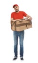 Emotional courier with damaged box on white background. Poor quality delivery service Royalty Free Stock Photo