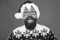 Emotional face. Good mood. Santa is coming. Santa man wear christmas tree party glasses. Happy bearded man with santa Royalty Free Stock Photo