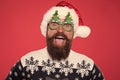 Emotional face. Good mood. Santa is coming. Santa man wear christmas tree party glasses. Happy bearded man with santa Royalty Free Stock Photo