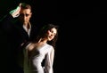 An emotional feeling of love. Theatre actors miming through body motions. Couple in love with mime makeup. Mime man and