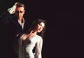 An emotional feeling of love. Theatre actors miming through body motions. Couple in love with mime makeup. Mime man and