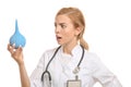 Emotional female doctor holding medical pear on white background