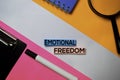 Emotional Freedom text on sticky notes with color office desk concept