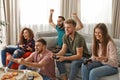 Emotional friends playing video games Royalty Free Stock Photo