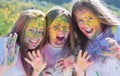 Emotional girls with happy mood with colorful dry colors. children with creative body art. Crazy hipster girls. Happy Royalty Free Stock Photo