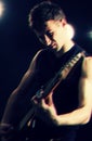Emotional guitarist at the stage Royalty Free Stock Photo