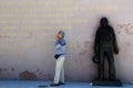 Emotional image of older gentleman standing near monument, Port of San Diego, California, 2016