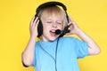The emotional kid in ear-phones Royalty Free Stock Photo
