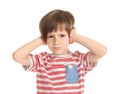 Emotional little boy covering ears with hands on white background Royalty Free Stock Photo