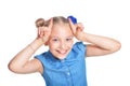 Emotional little girl in blue shirt Royalty Free Stock Photo