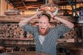 Emotional bearded man wearing Viking hat screaming watching the game Royalty Free Stock Photo