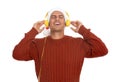 Emotional man with headphones on white background. Christmas music