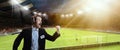 Emotional man, professional sport commentator, pressman during football match isolated over sport stadium background