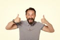 Emotional man with two thumbs up isolated on white background. Excited bearded guy happy face emotion. Thumbs up by both hands.