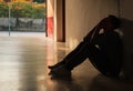 Emotional moment: man sitting holding face in hands, stressed sad young male having mental problems, feeling bad, depressed Royalty Free Stock Photo