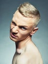 Fashion Haircut Man. Fanny grimace face Handsome Blond Boy Royalty Free Stock Photo