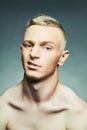 Fashion Haircut young Man. grimace face Handsome Blond Boy Royalty Free Stock Photo