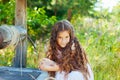 Emotional portrait of a little girl with long hair, summer day