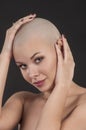 Emotional portrait of a naked girl shaved bald. Royalty Free Stock Photo