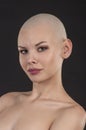 Emotional portrait of a naked girl shaved bald. Royalty Free Stock Photo