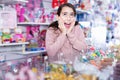 Emotional small girl choosing sweet candies in the candy shop Royalty Free Stock Photo