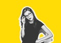 Emotional and sensitive hipster girl in glasses and a black t-shirt. Hand gestures. Royalty Free Stock Photo