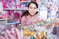 Emotional small girl choosing sweet candies in the candy shop Royalty Free Stock Photo