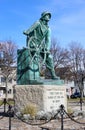 Emotional statue of Fisherman standing at the helm of ship, honoring sailors lost at sea, Fishermen`s Memorial, Gloucester,2018s, Royalty Free Stock Photo