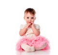 Emotional studio portrait of cute shy baby girl Royalty Free Stock Photo