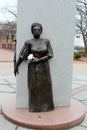 An emotional piece of history seen in female statue on concrete, African Burying Ground Memorial, Portsmouth, New Hampshire, 2018