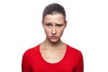 Emotional woman with red t-shirt and freckles.