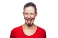 Emotional woman with red t-shirt and freckles. Royalty Free Stock Photo