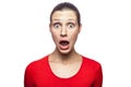 Emotional woman with red t-shirt and freckles. Royalty Free Stock Photo