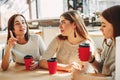 Emotional woman talk to her friends. Group of people enjoying co