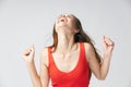 Emotional woman tilted her head up emotions red t shirt