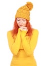 Emotional woman in yellow hat and blouse