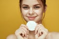 emotional women bare shoulders cotton pads and clear skin attractive look