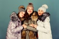 Emotional women in jackets. Group friends hang out together. Female clothes shop. Modern trendy female outfit. Gorgeous
