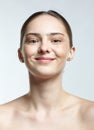 Headshot of emotional female face portrait with happy facial expression