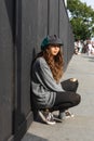 Emotionless girl with colorful hat Royalty Free Stock Photo