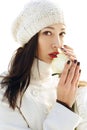 Emotive portrait of fashionable model in white coat and beret Royalty Free Stock Photo