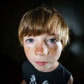 Emotive portrait of red-haired freckled boy, childhood concept Royalty Free Stock Photo