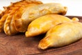 Empanada close up over wooden table.