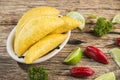 Empanadas and hot pepper on wooden background, traditional Colombian food Royalty Free Stock Photo