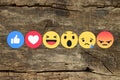 Empathetic Emoji Reactions on wooden background Royalty Free Stock Photo