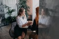 Empathy, friendly support, each other& x27;s support and sisterhood. Young woman comforting her friend sitting in cafe Royalty Free Stock Photo