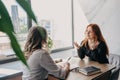 Empathy, friendly support, each other& x27;s support and sisterhood. Young woman comforting her friend sitting in cafe Royalty Free Stock Photo