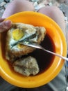 Empek-empek dengan isi telur ayam setengah matang