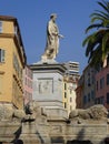 Statue of Emperor Bonaparte with lions in city square